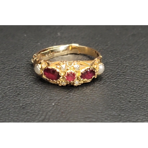 72 - EDWARDIAN SEED PEARL AND FACETED RED GLASS SET DRESS RING
on fifteen carat gold shank with decorativ... 