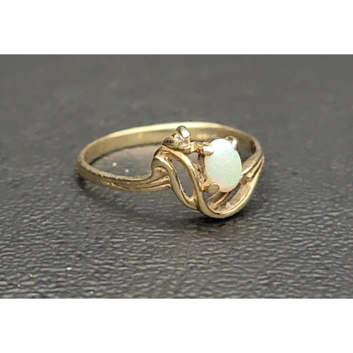 79 - PRETTY OPAL AND DIAMOND RING
the oval cabochon opal and small diamond in scrolling Art Nouveau style... 