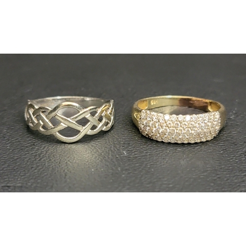 96 - FOURTEEN CARAT GOLD STONE SET RING
with a nine carat white gold ring of a Celtic knot motif, ring si... 