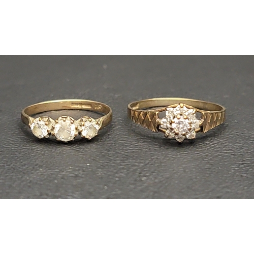 113 - TWO CZ RINGS
comprising a three stone example and a small cluster ring, both on nine carat gold shan... 