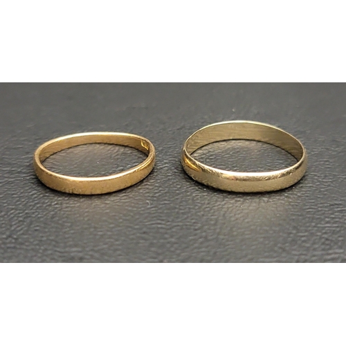 134 - TWENTY-TWO CARAT GOLD BAND 
ring size I-J and approximately 1.5 grams; together with a nine carat go... 