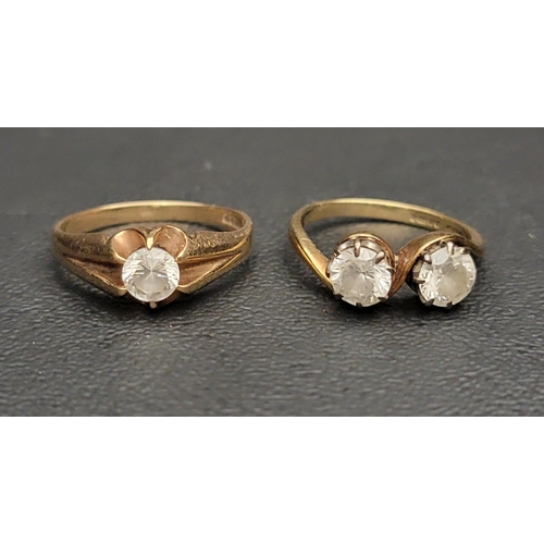 138 - TWO CZ SET RINGS
one a crossover example and the other a single stone, both on nine carat gold shank... 