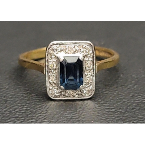 29 - DIAMOND AND BLUE/GREEN SAPPHIRE CLUSTER RING
the central sapphire in ten diamond surround, in eighte... 