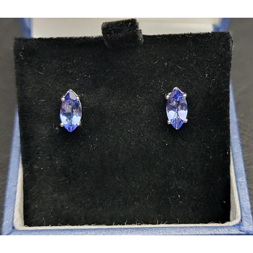 85 - PAIR OF CERTIFIED TANZANITE STUD EARRINGS
in nine carat white gold, the marquise cut AA+ tanzanites ... 