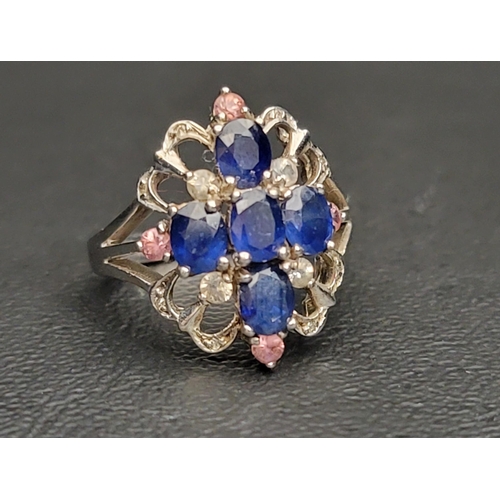 94 - ATTRACTIVE BLUE, PINK AND WHITE SAPPHIRE CLUSTER RING
on nine carat white gold shank with pierced se... 