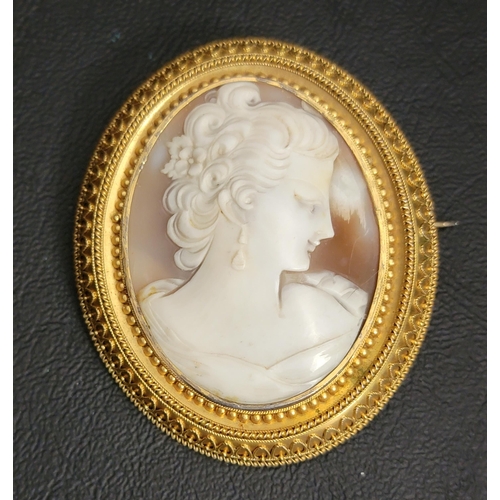 83 - LARGE AND IMPRESSIVE CAMEO BROOCH/PENDANT
in unmarked high carat gold mount with intricate bead and ... 