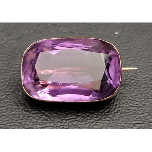 117 - AMETHYST BROOCH
in nine carat gold mount, the old cushion cut amethyst measuring approximately 23mm ... 