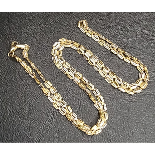 1 - FOURTEEN CARAT GOLD NECK CHAIN 
of alternating white and yellow gold rectangular links with a lobste... 