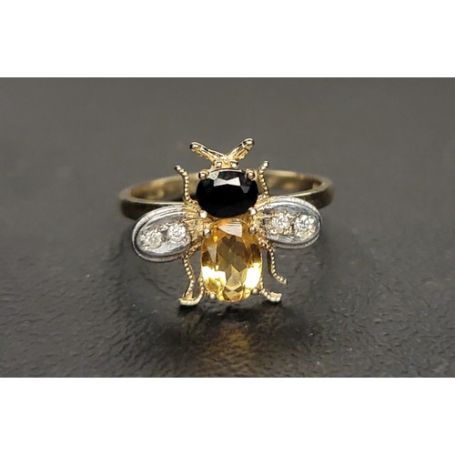 76 - CITRINE, SAPPHIRE AND DIAMOND BEE DESIGN RING
the body formed by an oval cut citrine and the head by... 