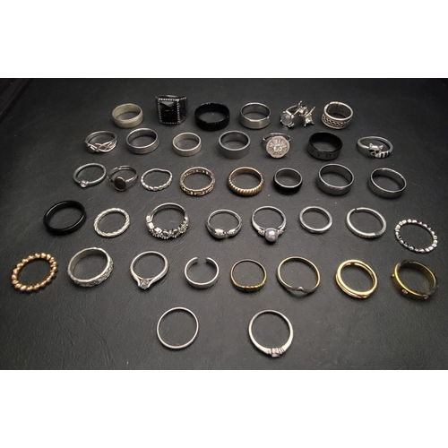 152 - SELECTION OF SILVER AND OTHER RINGS
including bands and stone set examples