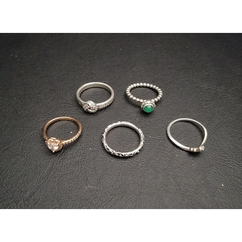 210 - SELECTION OF FIVE PANDORA RINGS 
comprising a Rose Elevated Heart Ring, a Tiara Wishbone Ring, a Reg... 