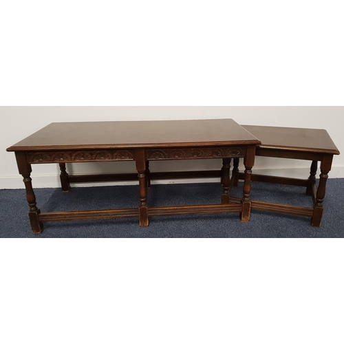 503 - OAK OCCASIONAL TABLE
with a rectangular moulded top above a carved frieze, standing on turned suppor... 