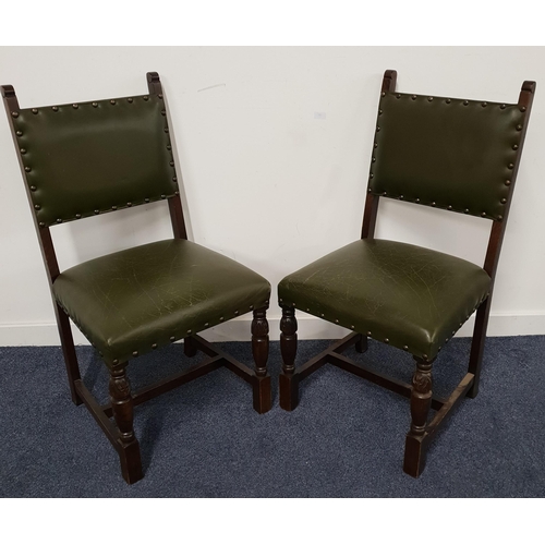 504 - PAIR OF OAK CHAIRS
with padded backs and seats with decorative stud detail, standing on turned front... 