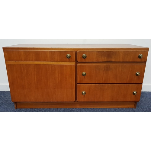 507 - MCINTOSH & CO TEAK SIDE CABINET
the rectangular top above a panelled cupboard door and three drawers... 