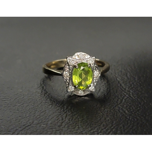 PERIDOT AND DIAMOND CLUSTER RING 
the central oval cut peridot measuring approximately 0.75cts, surrounded by eight diamonds, on a nine carat gold shank, ring size L-M