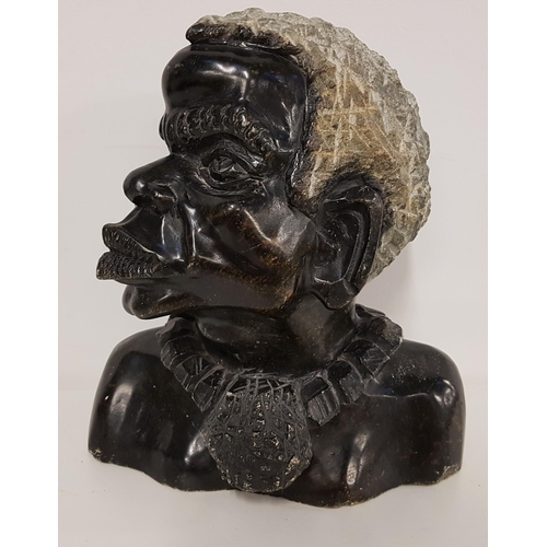 CARVED AFRICAN SOAPSTONE BUST
depicting an elderly man, 29cm high