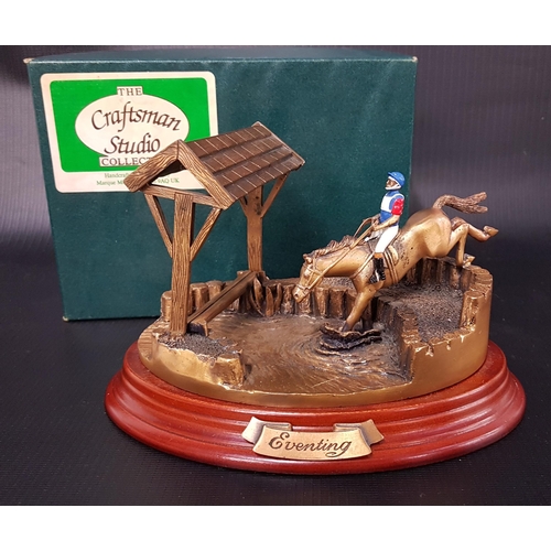 324 - THE CRAFTSMAN STUDIO COLLECTION
Eventing, a metal model of a cross country rider at a water jump, on... 