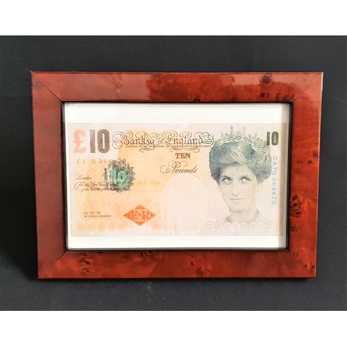 330 - BANKSY DI-FACED £10 NOTE
an original two sided Banksy note, the Queens face substituted with Diana, ... 