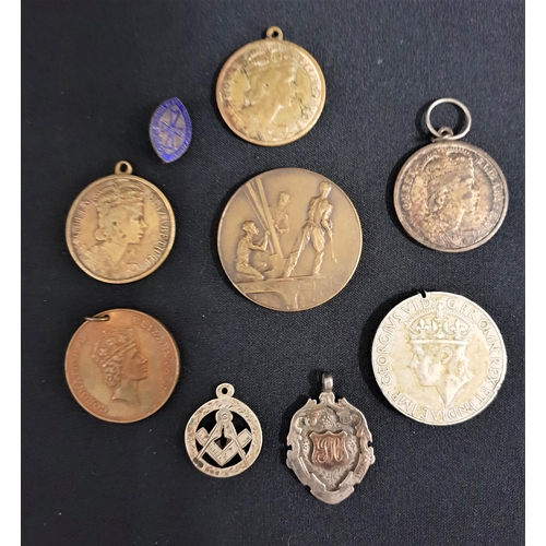 392 - SELECTION OF FOBS AND MEDALLIONS
including three Elizabeth II The Colony Of North Borneo medallions,... 