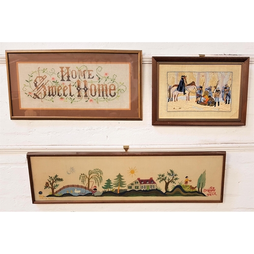 405 - THREE NEEDLE WORK PICTURES
including Home Sweet Home, 24cm x 60cm, a winter's scene of soldiers by a... 