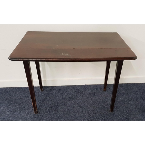 415 - MAHOGANY TABLE
with shaped drop flaps, standing on tapering supports, 89.5cm wide