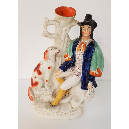 206 - 19th CENTURY STAFFORDSHIRE FLATBACK SPILL VASE
named Dog Tray, modelled as a seated gentleman with a... 