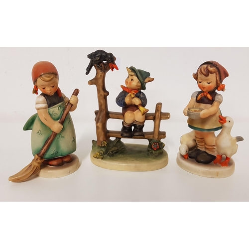 210 - THREE GOEBEL FIGURINES
depicting a girl feeding geese, 12cm high, girl with a broom, 12cm high, and ... 