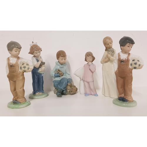 216 - SIX NAO FIGURINES
including a girl cuddling a puppy, 20cm high, two figurines of boys in dungarees h... 