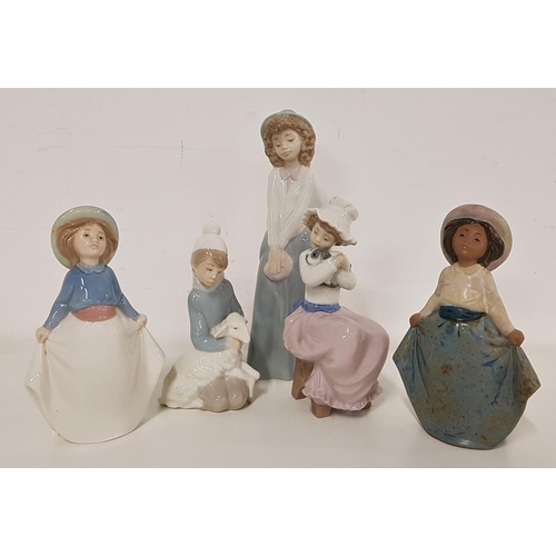 223 - FOUR NAO FIGURINES
including a girl in a long skirt and hat, 24cm high, girl seated holding a puppy,... 