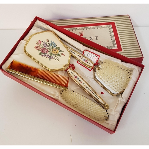 294 - REGENT OF LONDON DRESSING TABLE SET
comprising a hand mirror, two brushes and a comb, all with flora... 