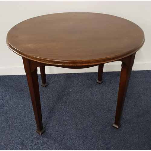 519 - WYLIE & LOCHHEAD MAHOGANY HALL TABLE
with a circular top above an arched frieze, standing on squared... 