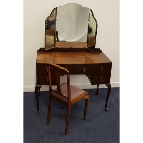 532 - MAHOGANY DRESSING TABLE
with a triple mirror back above two long and two short drawers, standing on ... 