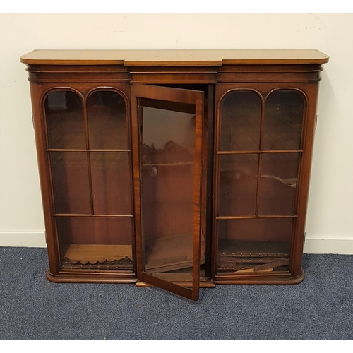 533 - VICTORIAN MAHOGANY BREAKFRONT BOOKCASE
with a central glass door flanked by a pair of glass panelled... 