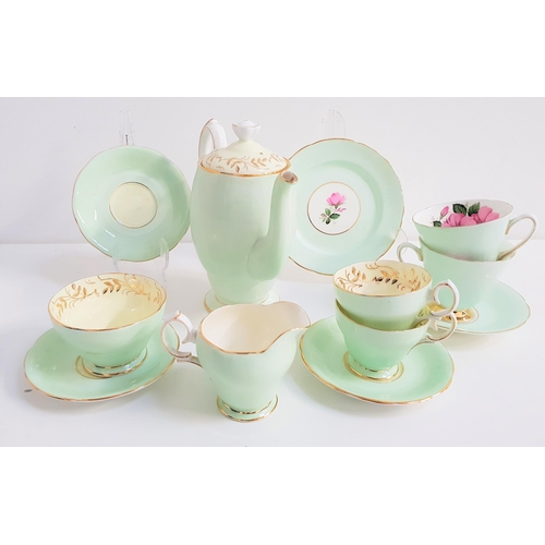 201 - OLD ROYAL PART TEA SERVICE
decorated with a pale green ground, roses and gilt highlights, comprising... 