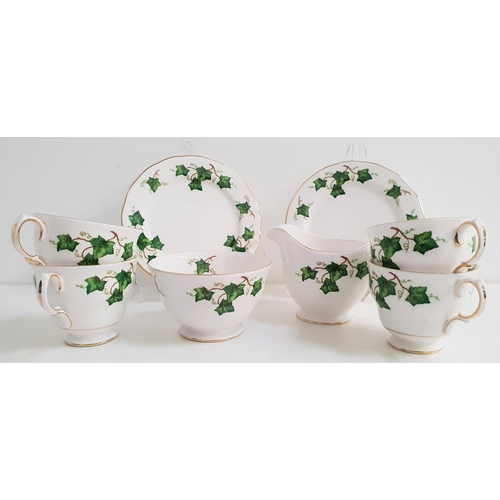 204 - COLCLOUGH TEA SET
decorated with an ivy leaf border with gilt highlights, comprising eight cups and ... 