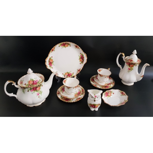 217 - ROYAL ALBERT OLD COUNTRY ROSES TEA AND COFFEE SET
comprising a tea and coffee pot, two milk jugs, tw... 