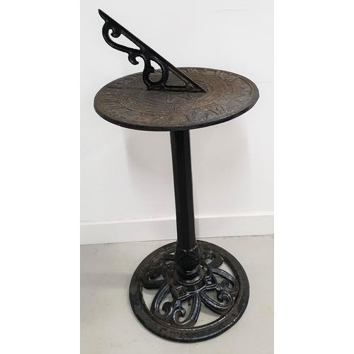 285 - CAST IRON SUNDIAL
with a circular top with Roman numerals on a tapering column and a circular pierce... 