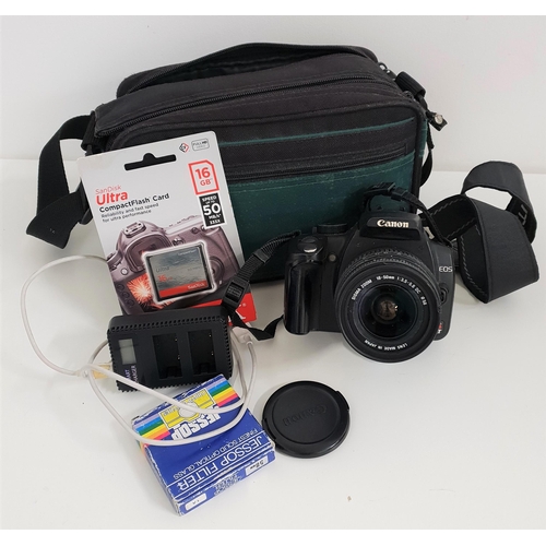 306 - CANON EOS DIGITAL CAMERA
with a Sigma Zoom 18-50mm lens, 16GB flash card, smart charger and battery,... 