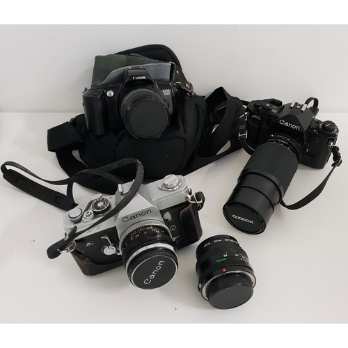 308 - CANON A-1 35mm CAMERA
with a Super Ozeck 80-205mm lens, Canon EOS 500 with a Canon Zoom 28-80mm lens... 