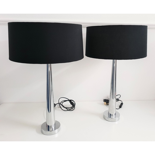 525 - PAIR OF TABLE LAMPS
raised on a circular chrome base with tapering chrome columns with black shades,... 