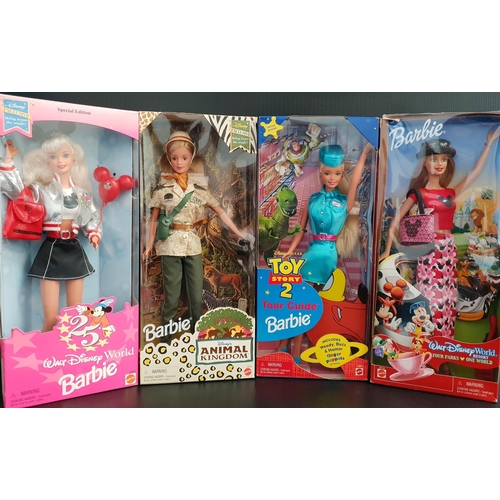 383 - FOUR BARBIE COLLS
comprising Toy Story 2 Tour Guide Barbie, Walt Disney World Resort - Four Parks On... 