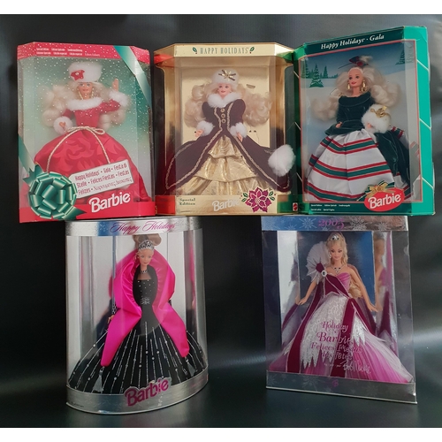 388 - FIVE BARBIE DOLLS
from the Happy Holidays collection comprising Gala, 2005 and three others, all box... 