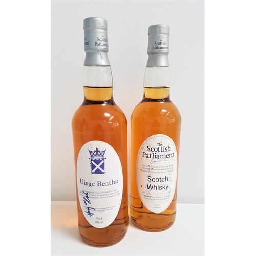 466 - TWO BOTTLES OF SIGNED BLENDED SCOTCH WHISKY
comprising one bottle of The Scottish Parliament Scotch ... 