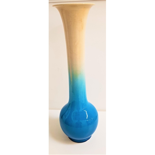 247 - JAPANESE KYOTO WARE BOTTLE NECK VASE
with a graduated blue glaze, 61.5cm high