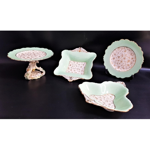 255 - PARAGON PART TEA SET
decorated with an apple green mottled ground with gilt flowers and gilt highlig... 