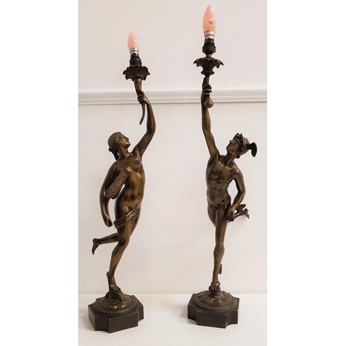 315 - AFTER GIAMBOLOGNA
a pair of decorative bronze figural lamps of Mercury and Fortuna, both holding alo... 