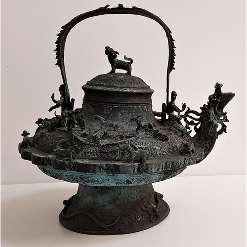 323 - EXTREMELY LARGE ZOOMORPHIC BRONZE CEREMONIAL KETTLE
from Brunei or Saranak, cast with a dragon spout... 