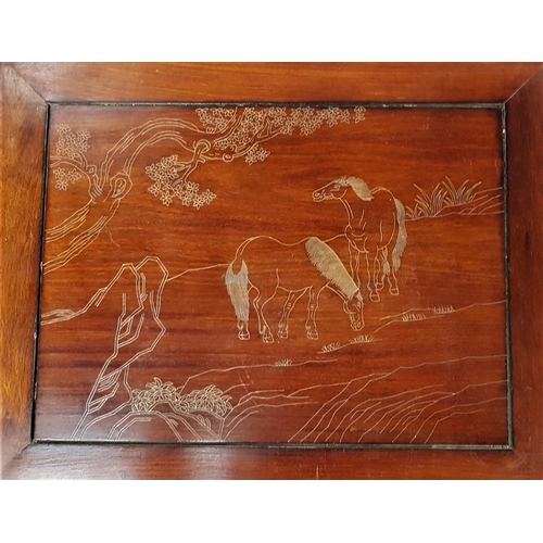 501 - NEST OF FOUR CHINESE HARDWOOD TABLES
each decorated with galloping horses above a shaped frieze, 69c... 