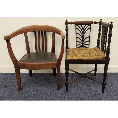 513 - EDWARDIAN MAHOGANY CORNER CHAIR
with a pierced back above a needlework seat, standing on turned supp... 