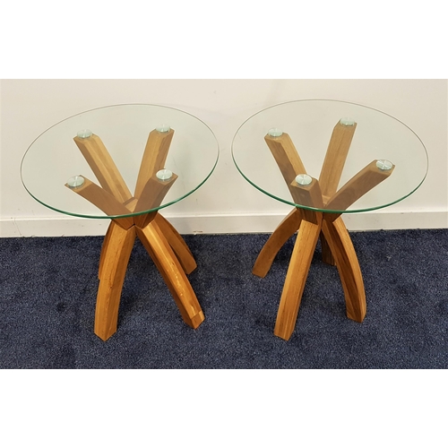 547 - PAIR OF SIDE TABLES
each with a circular glass top on oak cross strut supports, 61cm x 50cm (2)